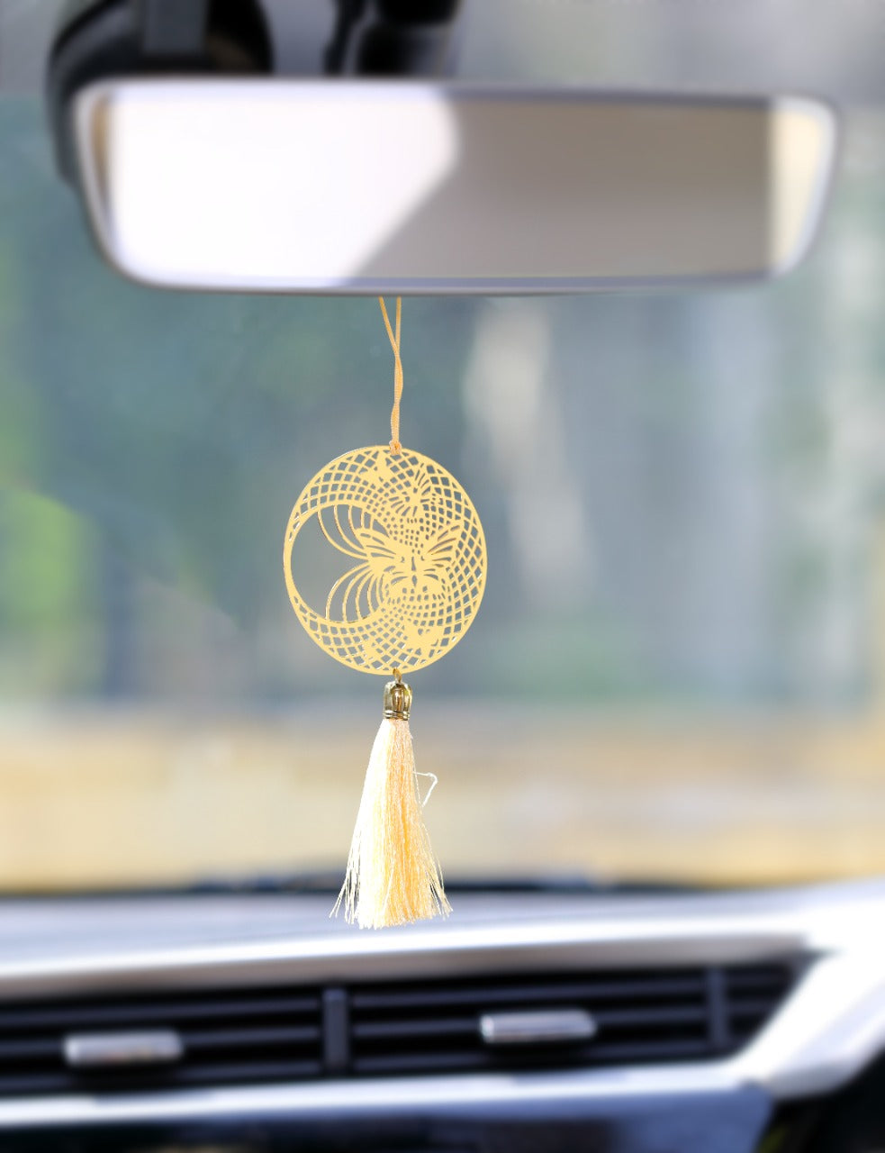 https://www.adoraa.in/cdn/shop/products/Adoraa_good_vibes_only_car_rear_view_mirror_hanging_decor_brass_7.jpg?v=1703238946